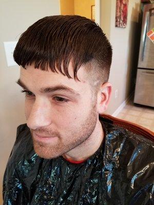 My husband's haircut that he received from Sport Clips Haircuts of Greenwood Springs. This was taken just BEFORE we fixed it at home.