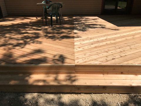 This was a deck replacement with framing upgrades and cedar wood.