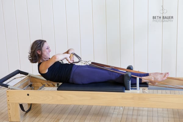 Paula, on the Pilates Reformer