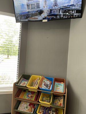 Interior of what appears to be child's waiting area, these were the only "books/toys" that I saw in the area.