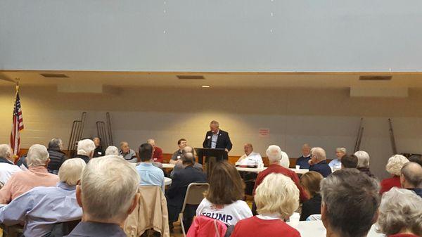 Mac McCutcheon speaking at the Madison County Republican Men's Club breakfast