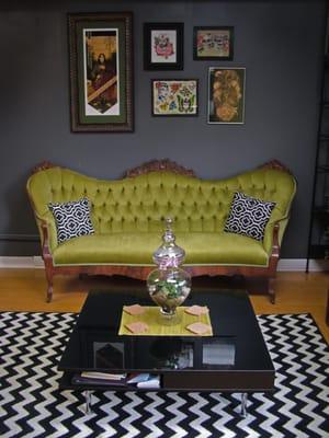 Inside the waiting room at Grim North, Victorian antique couch.