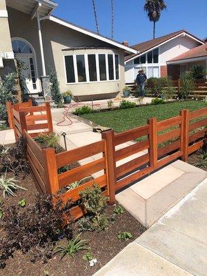 Custom fence, new plants and new hardscape