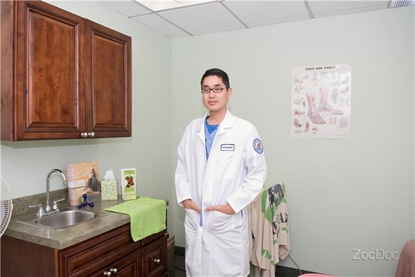 Dr. Tjoe in his office.