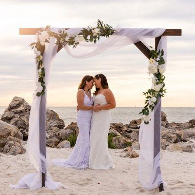 Rustic Arch with white flower garland in Clearwater Beach