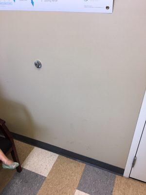 Stains on the wall in the patient room