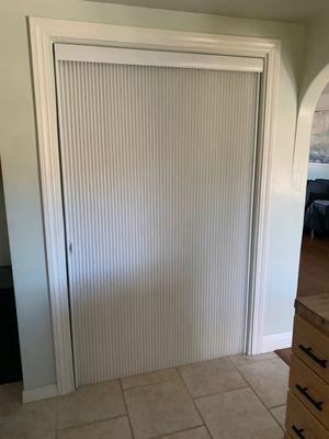 Custom Hunter-Douglas sliding pantry door