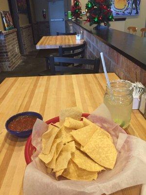 Chips and salsa with a margarita