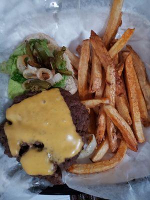 Hand made cheeseburger with lettuce, grill bell peppers and onions with hand cut fries.