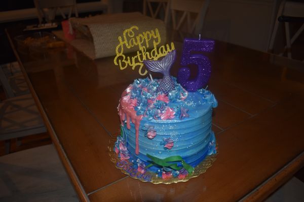 Multi-layer, strawberry, mermaid birthday cake.