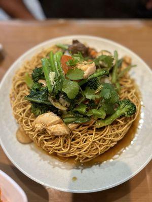 Combination stir fry with crispy rice noodles.