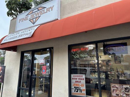 The storefront--not to be confused the the jewelry and watch repair stand in the same parking lot.