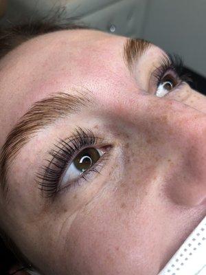 Premium Keratin Lash Lift/Tint duo & Keratin Brow Lamination.  Her lashes look like extensions!