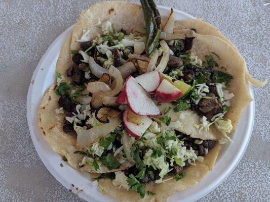 Tacos de asada on fresh tortillas. So good!