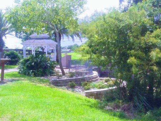 Outdoor gazebo with various plants