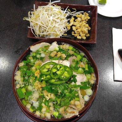 Hu Tieu Nam Vang with a side of boiled bean sprouts and pork fat.