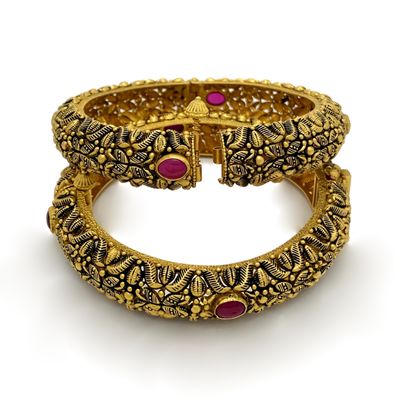 Engraved 22k Gold with a black finish for an oxidized Antique look, enhanced with Semi-precious Ruby.