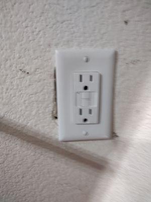 Over cut of opening on one outlet in garage.