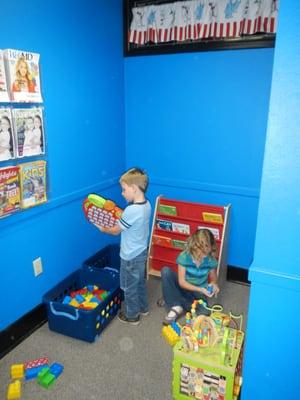 Lovely waiting room. The whole place is Cat in the Hat-themed. Lily and Joe were enthralled.