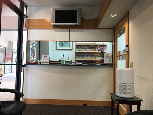 New front desk with full plexiglass barrier.