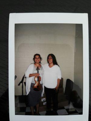 The Voilin instructor Jazmin and Xochitl the two that want all kids to learn music.