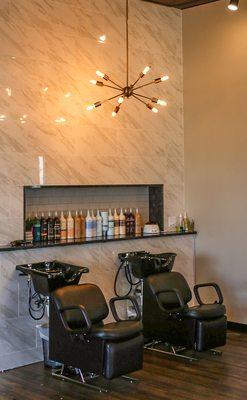 Relax in our massage chairs as we wash and rinse your hair at Be Salon