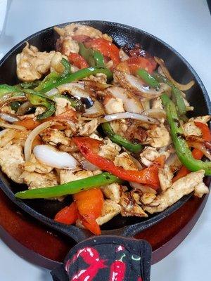 Chicken fajitas! Came out sizzling hot! Made when ordered!