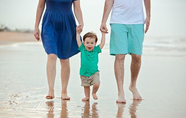 Little kid taking steps on the beach - Liz Scavilla Photography