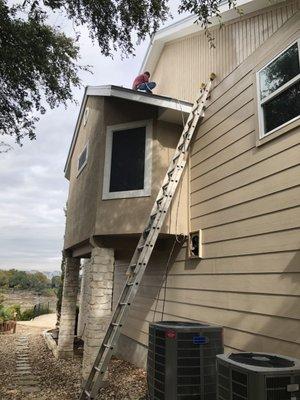 Spraying exterior of house