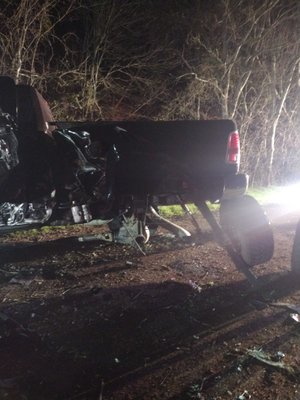 Truck suspended by leaf spring