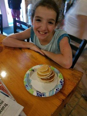 This little miss really enjoys her silver dollar pancakes 3