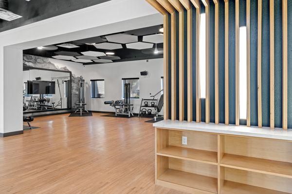 Brand New Fitness center with free weights, cardio and TRX equipment.