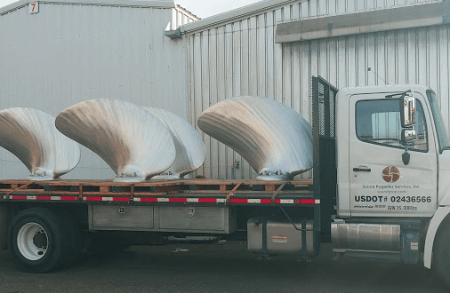 Transporting our repaired props back to the shipyard.