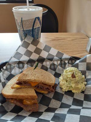 Roast beef melt with potato salad and tea