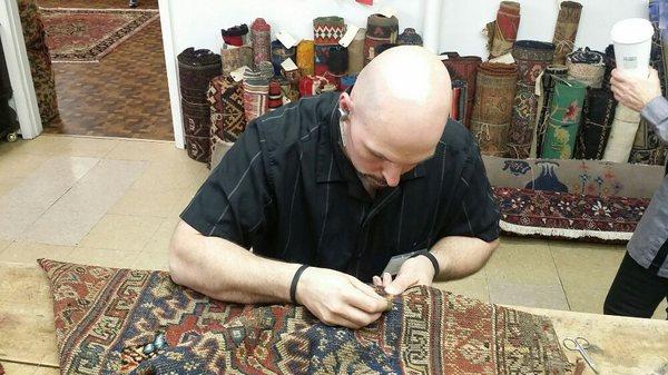 Repairing a Persian rug