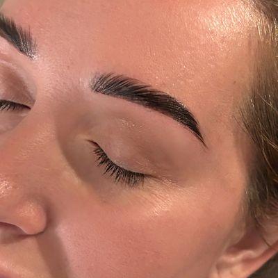 Brow lamination, wax & tint.