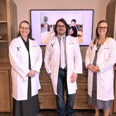 Carolyn Lenz-Tucker, NP.  Dr. Patrick Beeman, OBGYN, and Jenna Shorer, NP grace our lobby and medical practice with their love for patients.