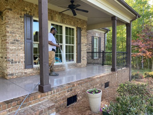 Porch rinsing driveway cleaning