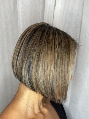 Beautiful fall tones through highlights and precision hair cutting.