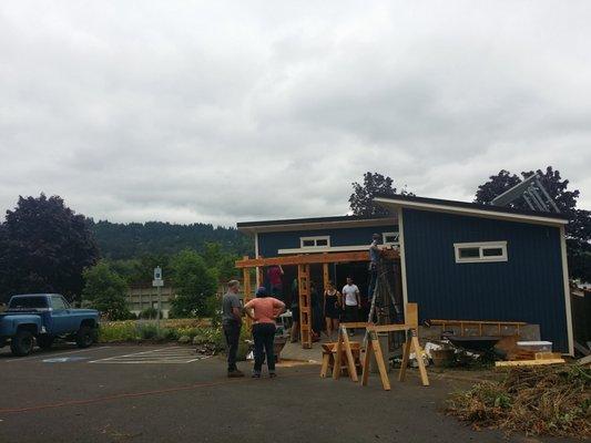 Toolbox Project volunteers building their pergola.