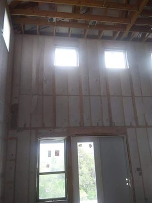 Blow insulation in high walls