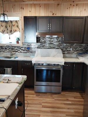 We did this mosaic tile backsplash which really ties the room together well.