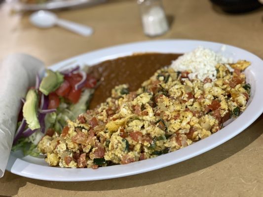 Huevos a la Mexicana with handmade corn tortillas and a side salad instead of rice. Absolutely divine