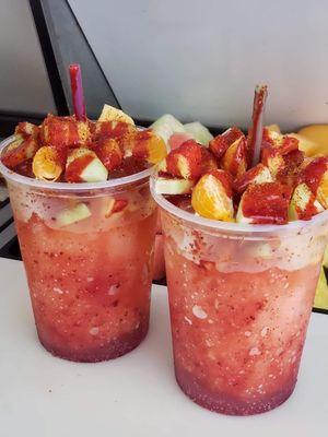 Rusa
A cold drink with made with Topo Chico or grapefruit. Contains chamoy, tajin and fresh fruit.