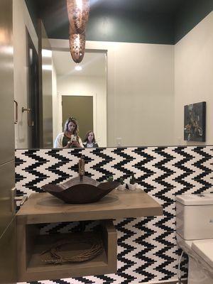 previewing homes out in Williamson River Ranch in Eagle. This modern bathroom is jaw-dropping with that beautiful tile work.