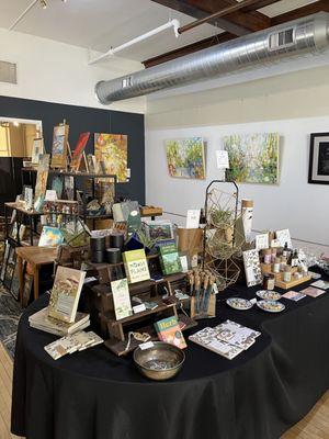 Fine art, nature-themed products, and artisan made goods.