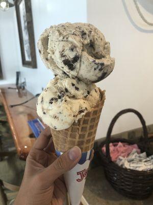 Cookies and cream and cookie dough on a waffle cone