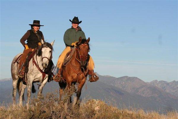 Rod and Christie gathering cattle