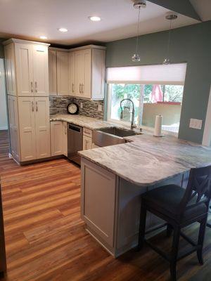 Repainted kitchen also did the back splash tile.