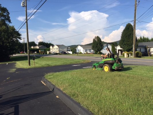 Mowing the Church Grounds. Good day for the Lords work!